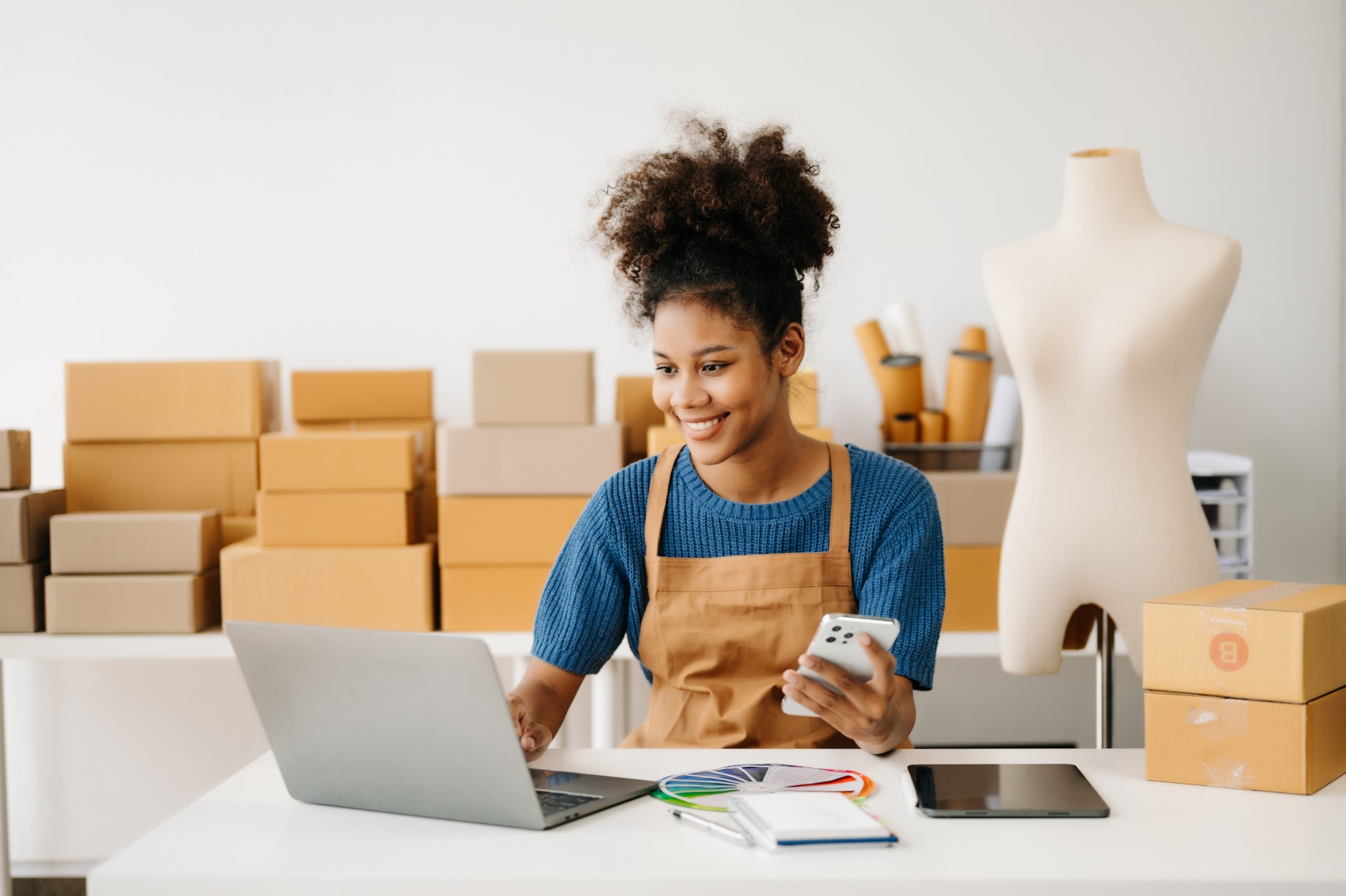 A woman working on her DIY marketing strategy